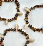 Load image into Gallery viewer, Tigers Eye Cowrie Shell Crystal Bracelet

